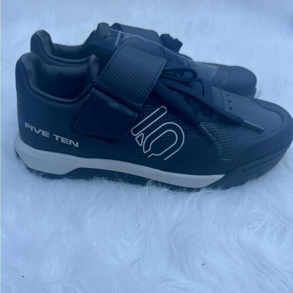 Five Ten mountain bike sneakers.  Men’s size 6 (equivalent to women’s size 8).